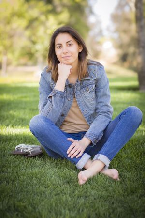 Iranian Young Woman Sitting in the Park