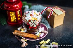 Marshmallow hot chocolate on table with red lantern and gift 5wZwA0