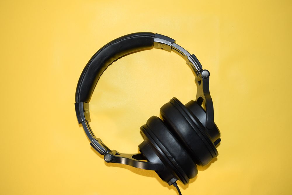 Headphones on yellow table