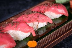 Delicious sushi set served on wooden tray