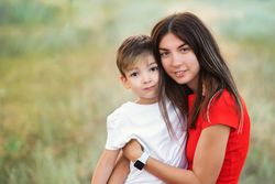 Affectionate mom with son outdoor