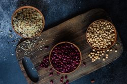 Top view of dry beans and rice in bowls