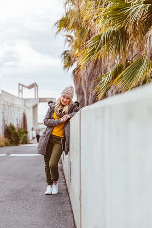 Portrait of blonde woman posing in the city
