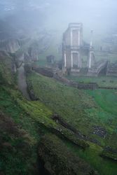 Majestic view of ancient ruins in fog