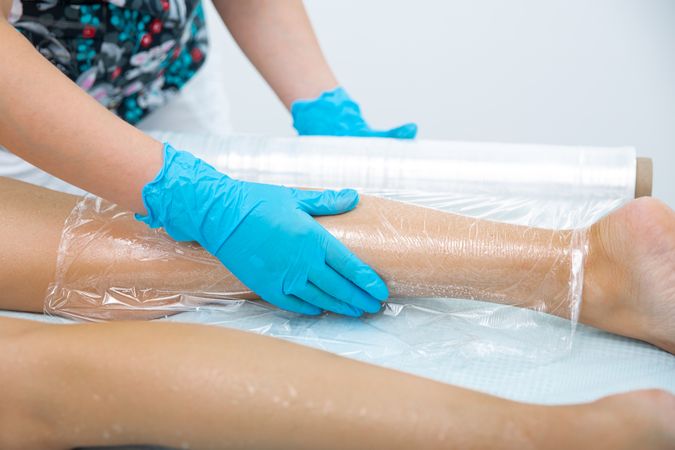 Calf massage with body wrap
