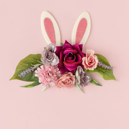 Bunny rabbit ears with spring flowers and leaves