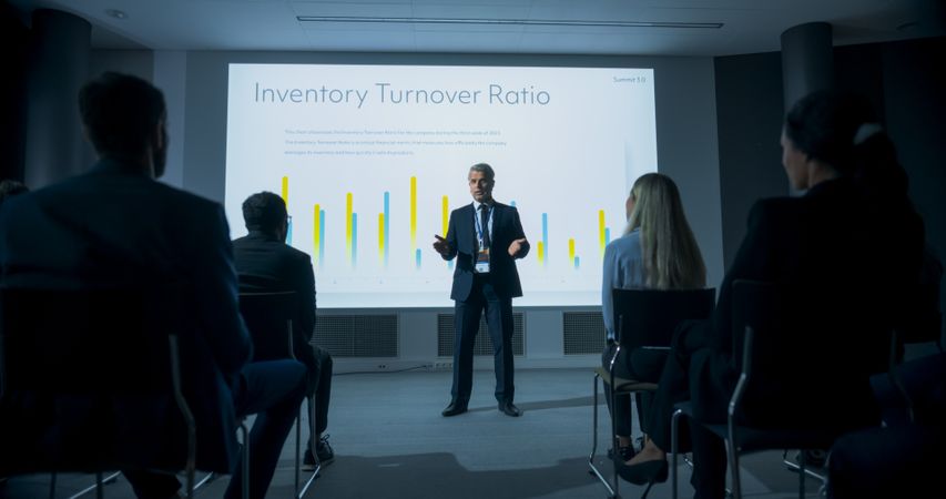 Corporate Event: Male Tech CEO Giving Presentation To Colleagues or Investors In the Conference Room Of Innovative Startup Office.