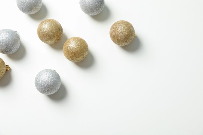 Flat lay with christmas balls on blank background, space for text
