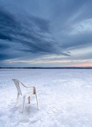 Chair on salt mine during sunset