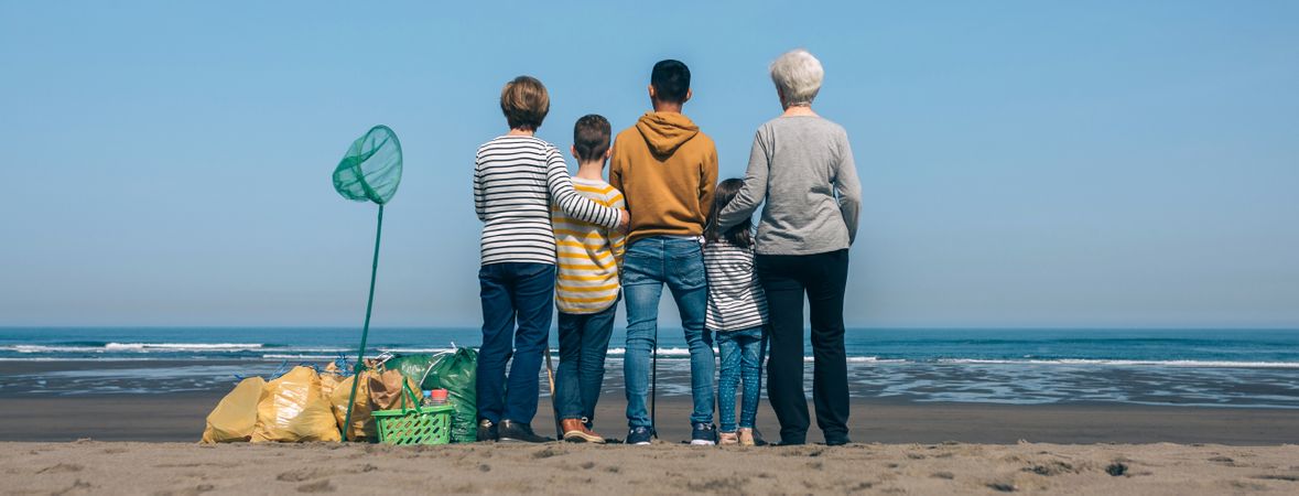 Volunteers backwards watching the sea