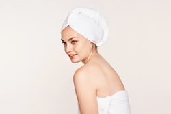 female with radiant body after cosmetic procedure