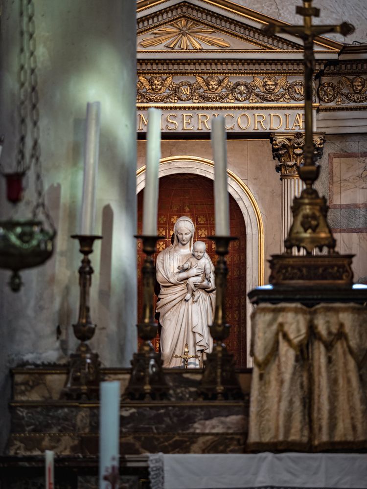 Ancient sculpture in one of the churches of Paris. Antique art.