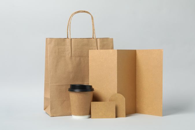 Food delivery or business mockup on light gray background, space for text