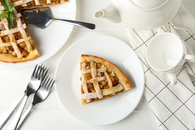 Composition with apple pie on wooden background. Tasty lunch. Homemade breakfast