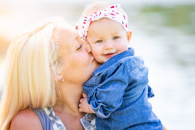 Young White Mother and Daughter At The Park