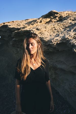 pensive woman looking down