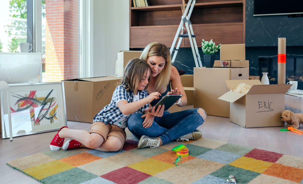 Mother and son playing the tablet