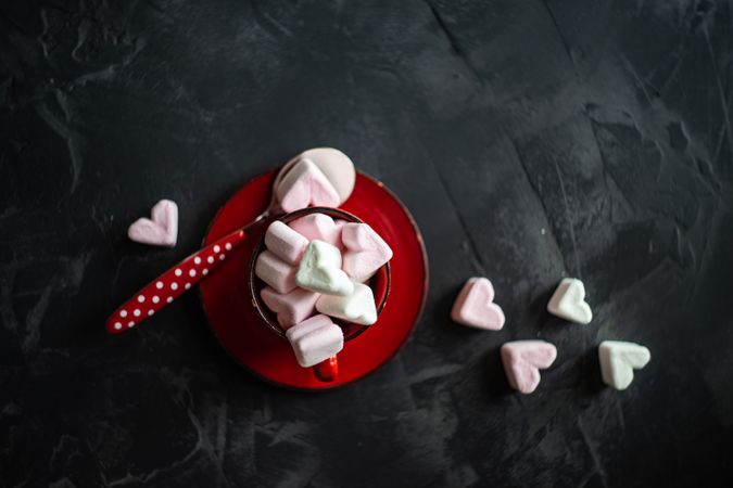 St. Valentines concept with marshmallow in red mug