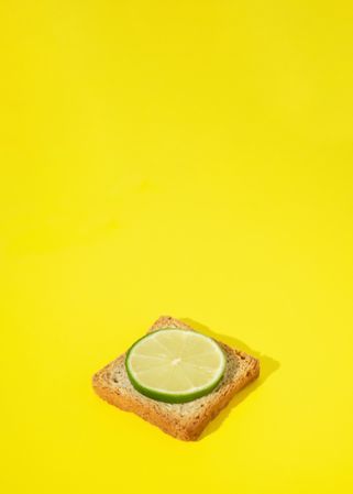 Toasted bread with slice of lime