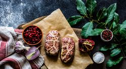 Raw cutlets of abkhazura on butcher paper