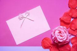 Pink rose and a cute message card