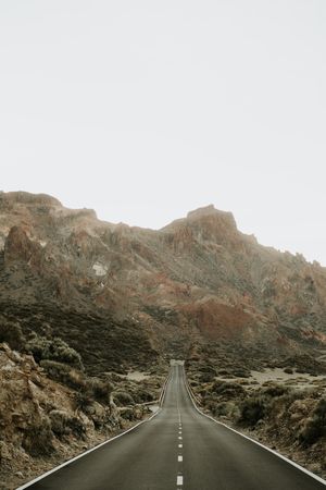 Road in desert to hills