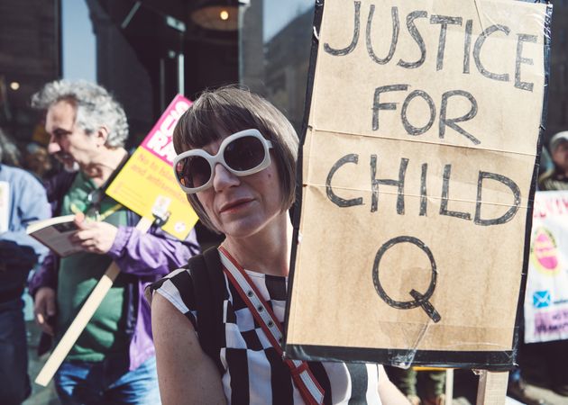 London, England, United Kingdom - March 19 2022: Woman with “Justice for Child Q”