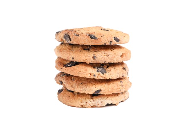 Stack of tasty chocolate chip cookies on blank background