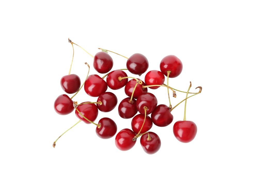 ripe cherry fruits, isolated on blank background
