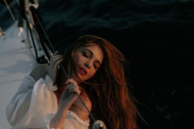 Pretty woman enjoying sea journey