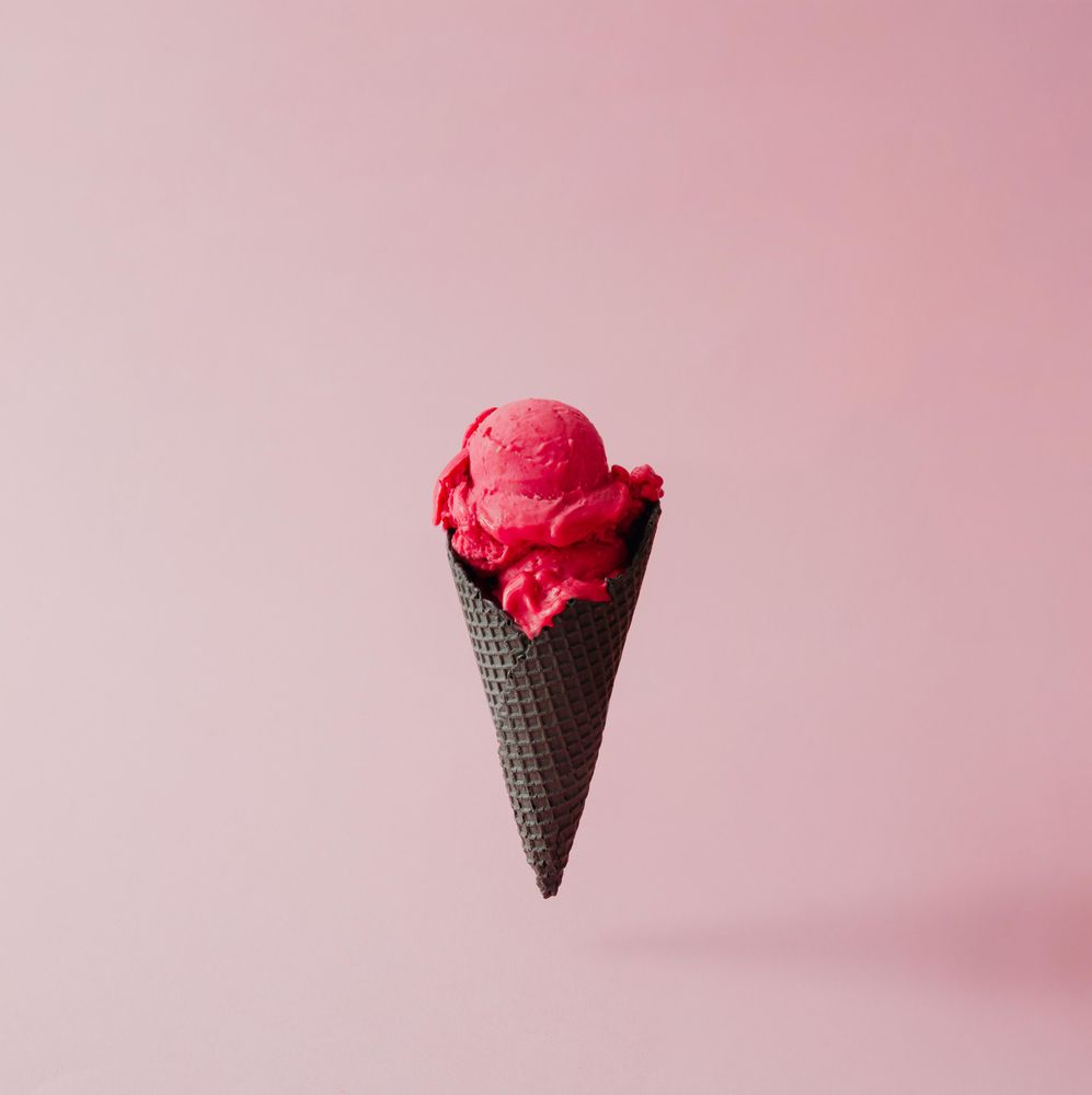 Double Scoop Of Fresh Strawberry Ice Cream In Waffle Cone Against Dark  Textured Background Stock Photo, Picture and Royalty Free Image. Image  72815792.