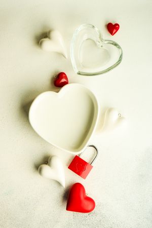 Two heart shaped plates with red padlock