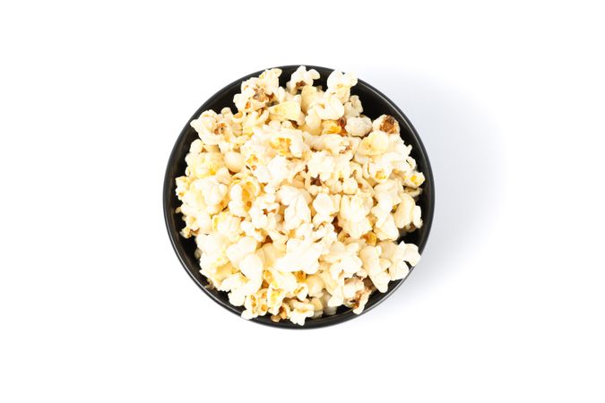 bowl with popcorn isolated on background