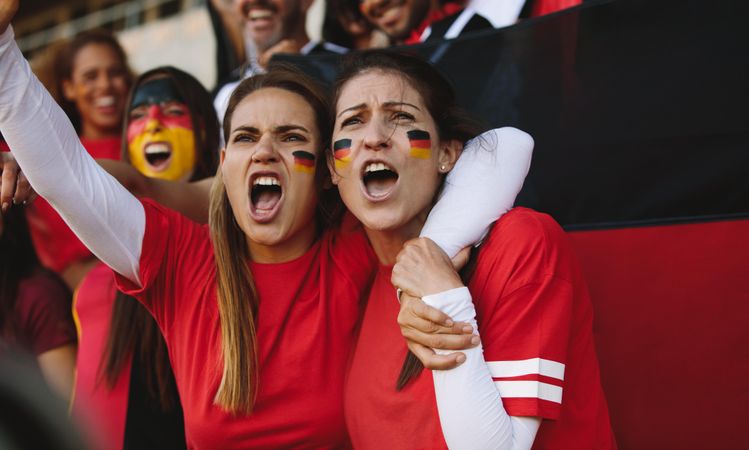 Females from Germany cheering from stadium fan zone