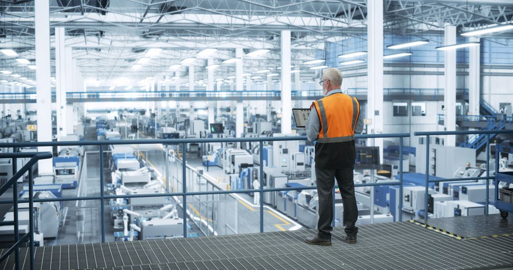 Industrial Engineer Working at a Technology Factory.