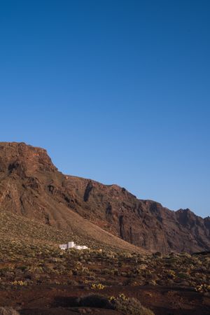 Mountain on background of blue sky