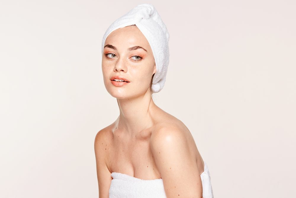 female with radiant body after cosmetic procedure
