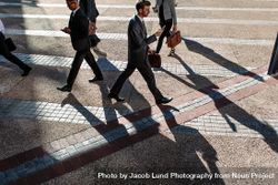 Business people walking to office in the morning on a busy street 4jVXMR
