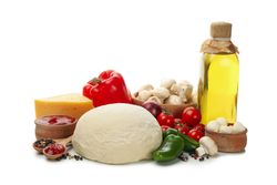 Dough and ingredients for cooking pizza isolated on blank background
