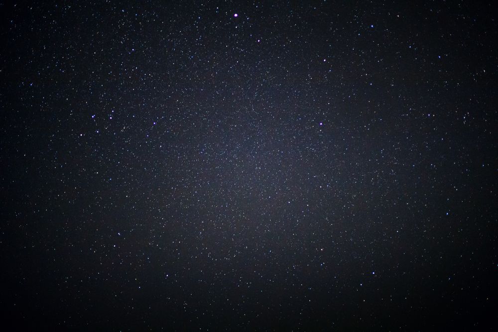 Starry night sky and milky way galaxy with stars and space dust in the universe
