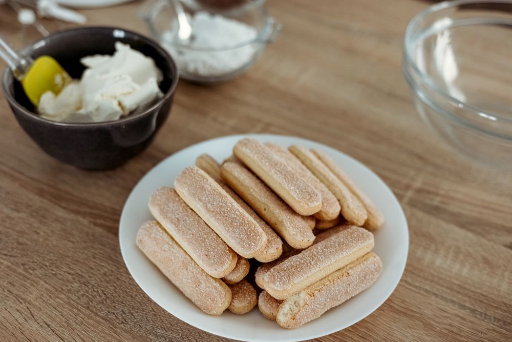 Ingredients for cooking tiramisu, ladyfingers and mascarpone cheese