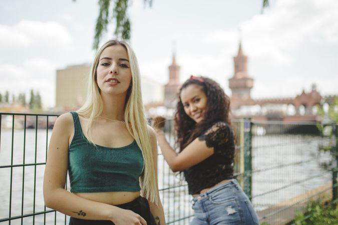 Cheerful friends on city river