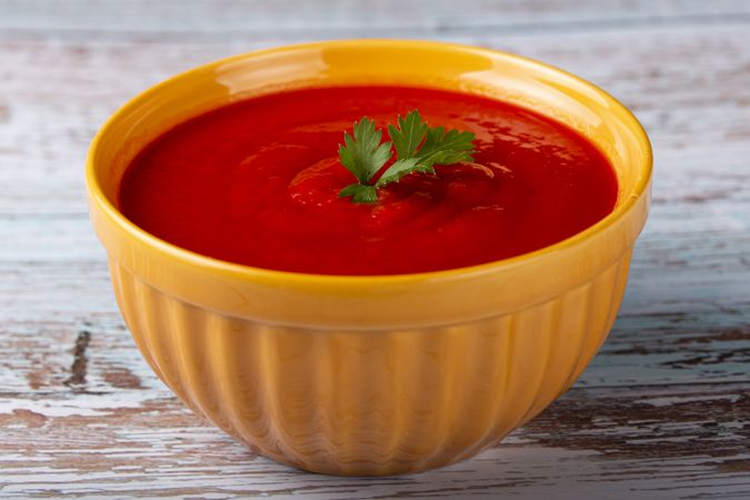 Delicious homemade tomato soup in bowl.