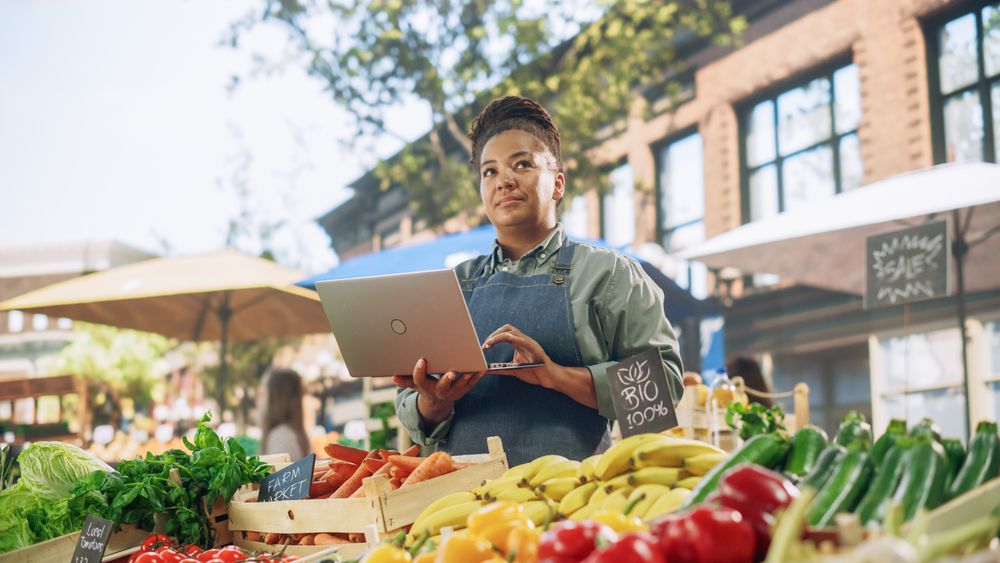Black Businesswoman Contacting Suppliers Online