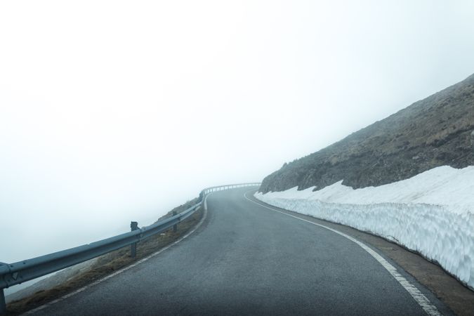 Road in foggy mountains