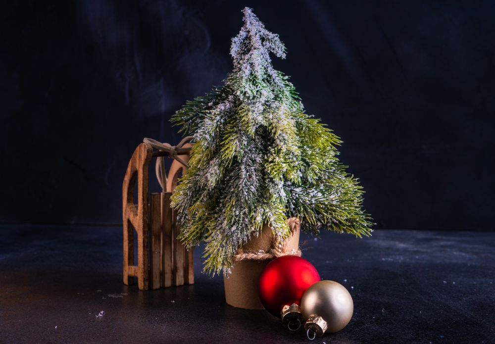 Mini Christmas tree with baubles and sleigh
