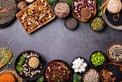 Variety of healthy vegan, plant based protein source and body building food with copy space