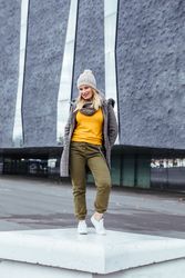Blonde woman posing in the city