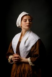Medieval maid posing in studio