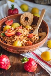 Delicious breakfast bowl with granola and fruit